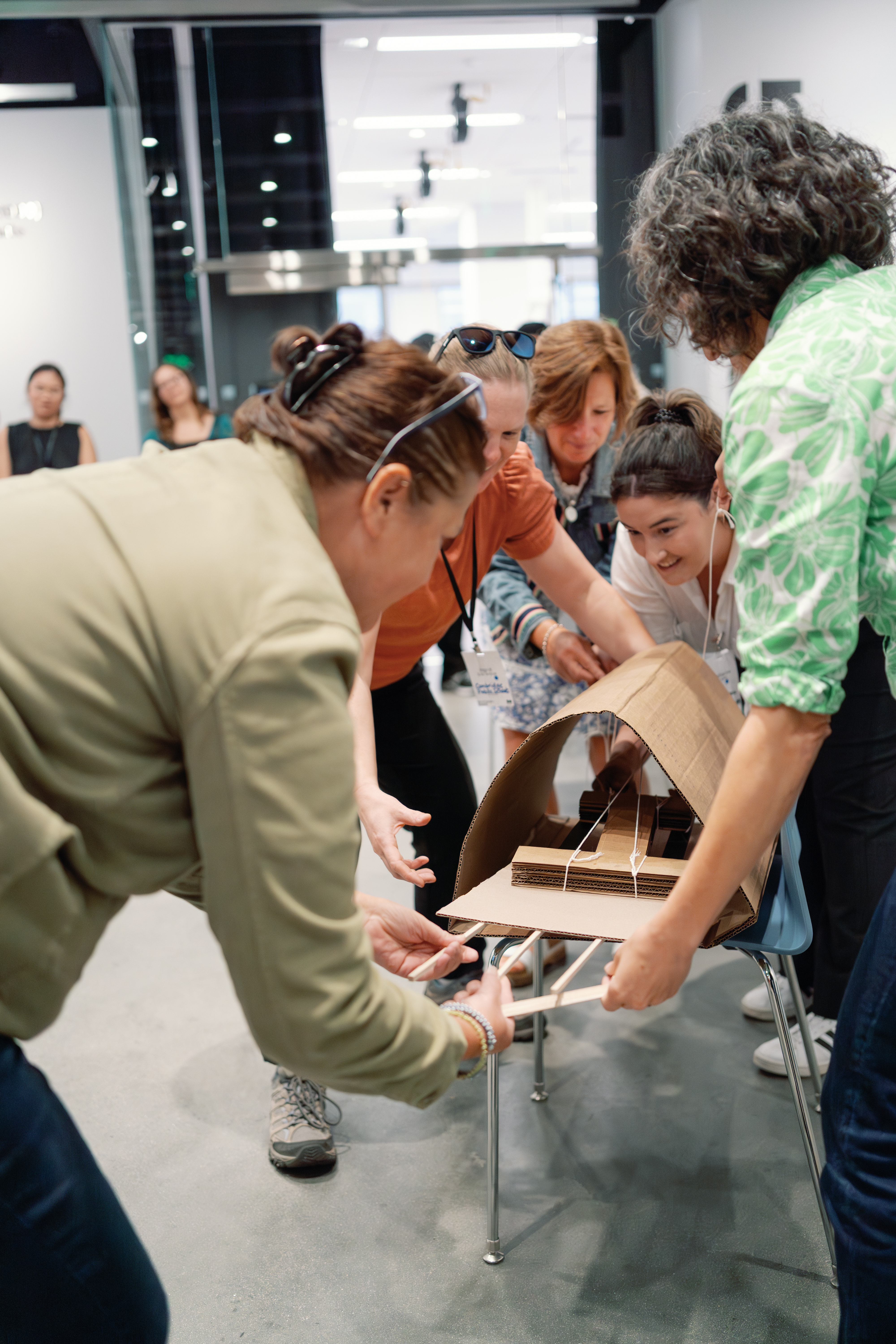 Participants collaborating on a hands-on prototyping exercise